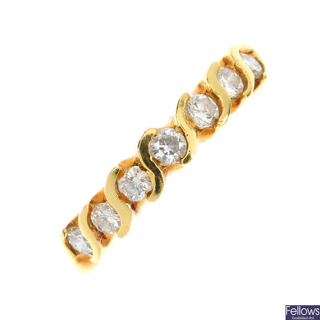 An 18ct gold diamond seven-stone ring.