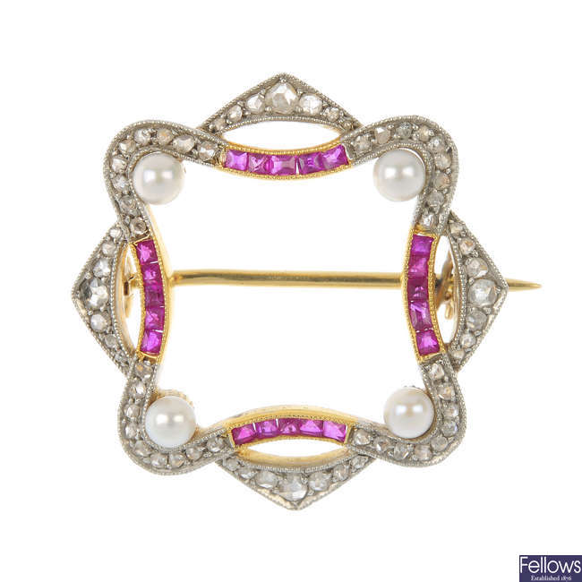 An early 20th century 18ct gold and platinum ruby, diamond and seed pearl brooch.