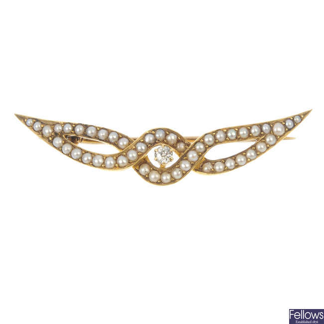 An early 20th century 15ct gold split pearl and diamond brooch.