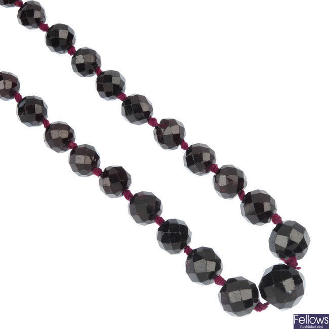 A garnet bead necklace.