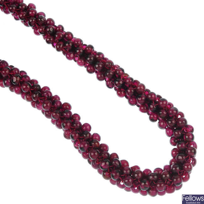 A garnet bead necklace.