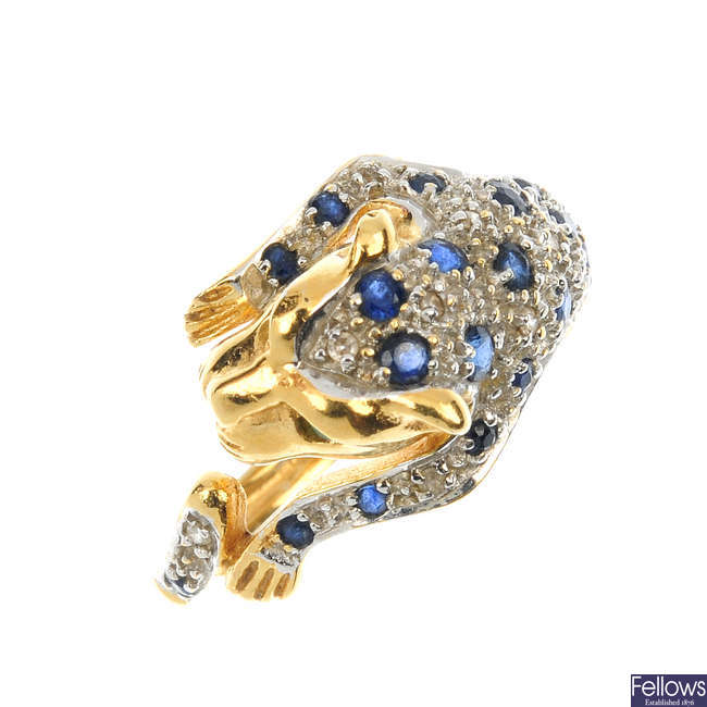 An 18ct gold diamond and sapphire leopard ring.