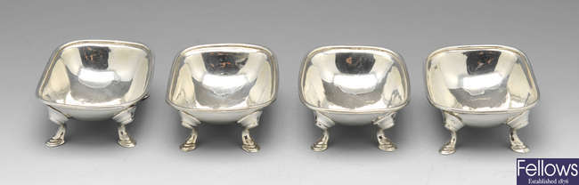 A set of four George III silver open salts.