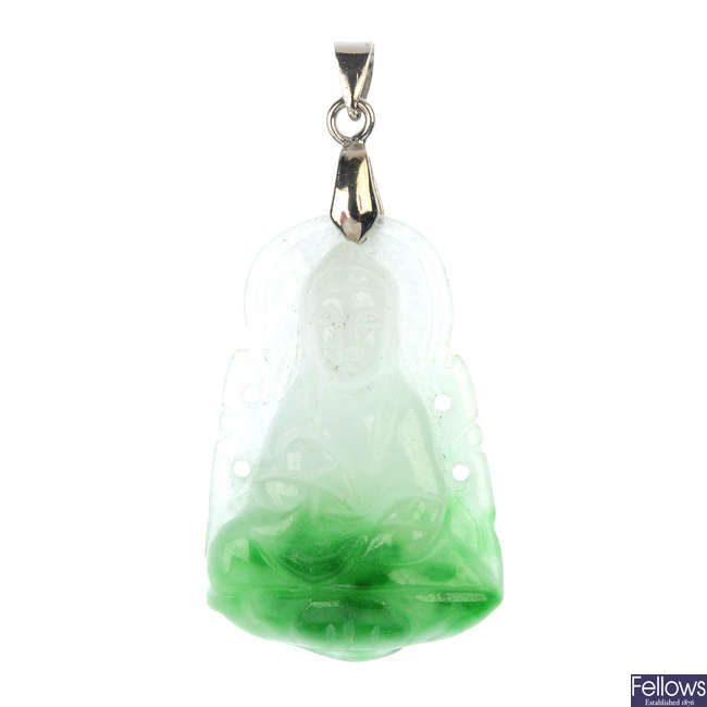 A jade Buddha pendant.