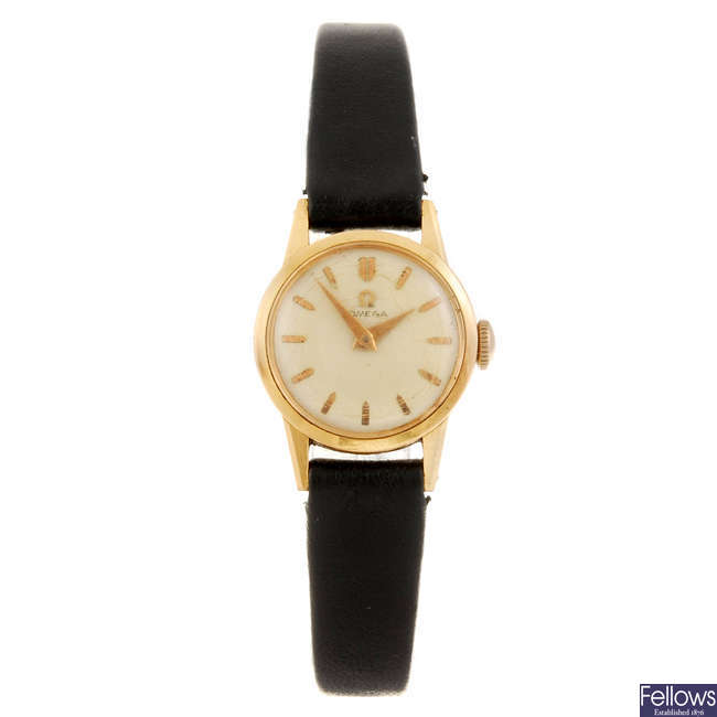 OMEGA - a lady's wrist watch.