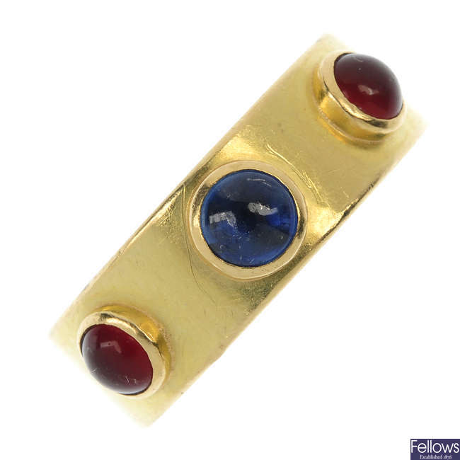 A sapphire and carnelian band ring.