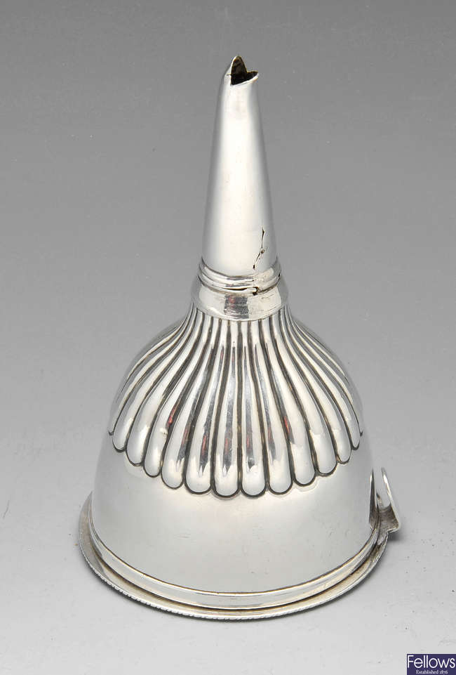 A George III silver wine funnel.