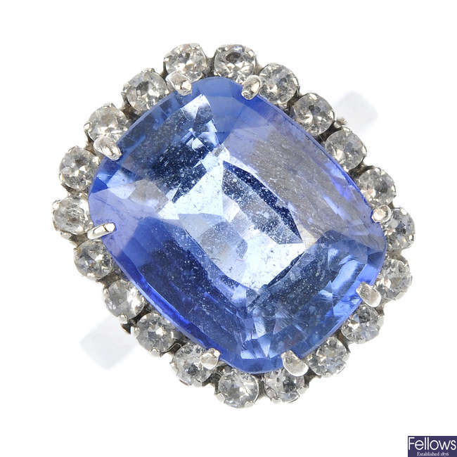 A synthetic sapphire and paste cluster ring.