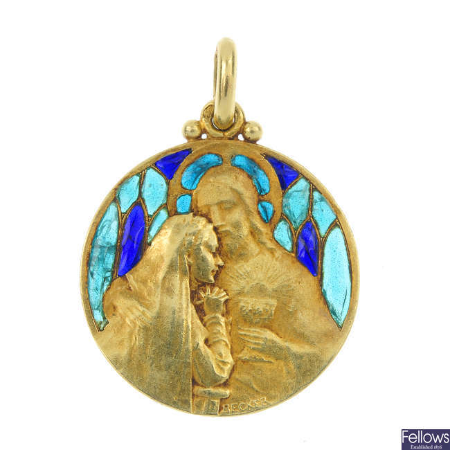 An early 20th century 18ct gold enamel religious pendant.