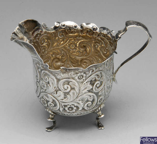 A late Victorian silver cream jug.