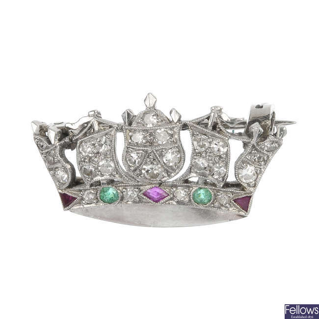 A mid 20th century diamond, ruby and emerald Naval Crown brooch.