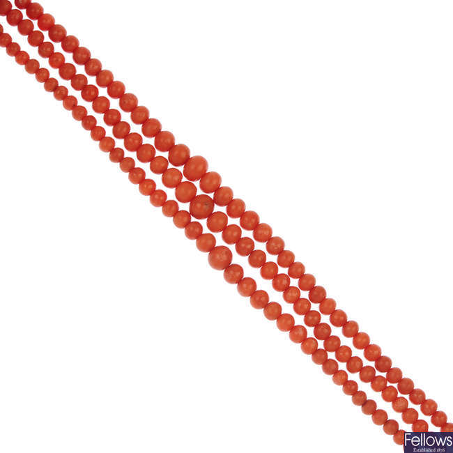 A coral bead three-row necklace