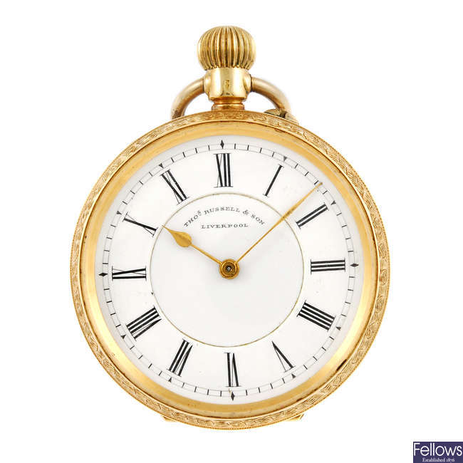 A yellow metal open face pocket watch by Thomas Russell.
