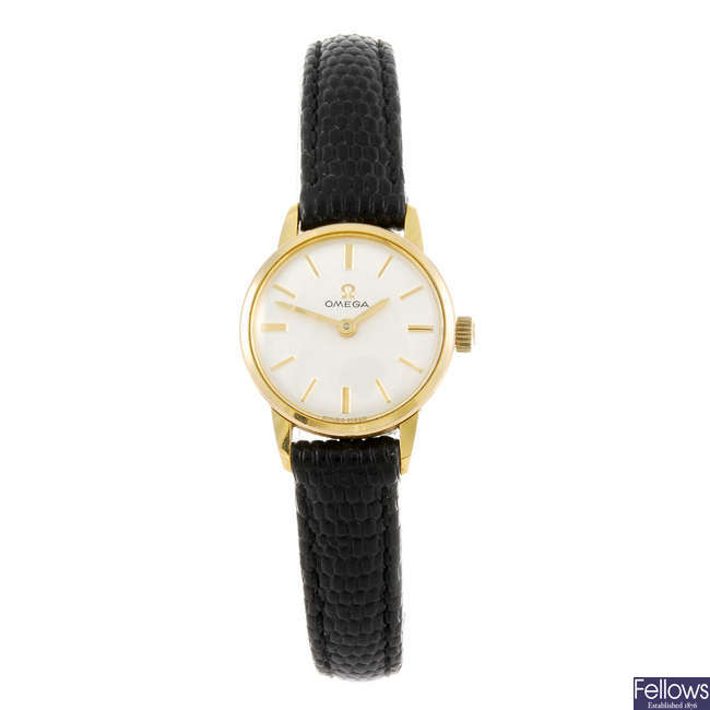 OMEGA - a lady's wrist watch. 
