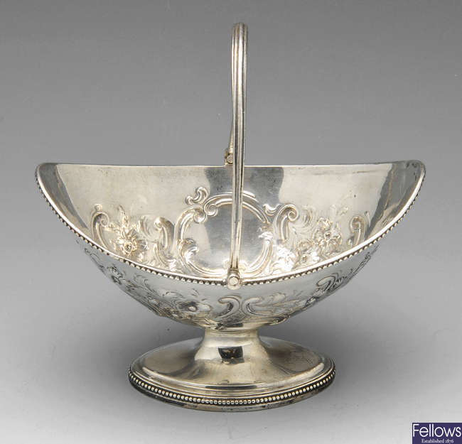 A George III silver sugar basket.