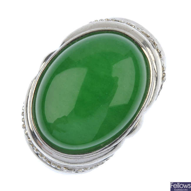 Two items of jewellery, to include a treated jade ring and a Danish brooch.