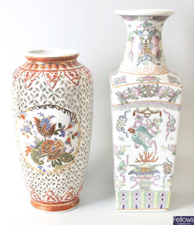 A box containing a selection of various Chinese scent bottles and vases
