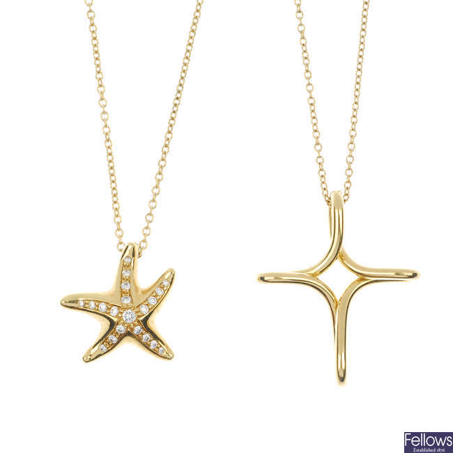 (124258-10-A) TIFFANY & CO.  - a selection of four pendants and chains. 