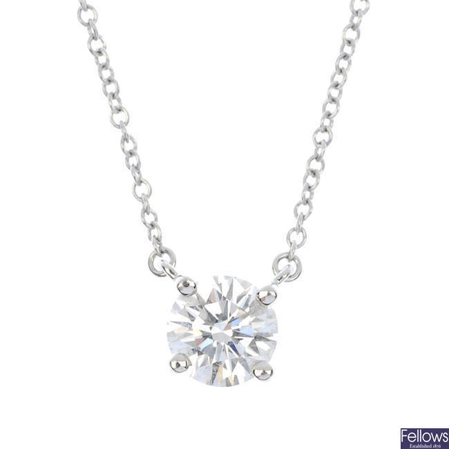 (124258-4-A) TIFFANY & CO. - a platinum diamond single-stone pendant.