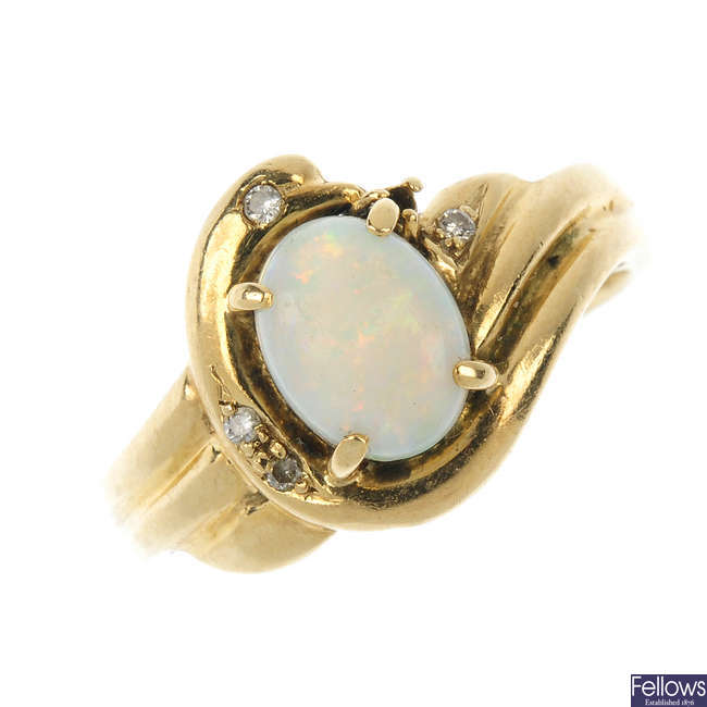 An opal and diamond dress ring. 
