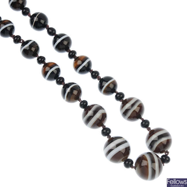 An agate and black-gem bead necklace.