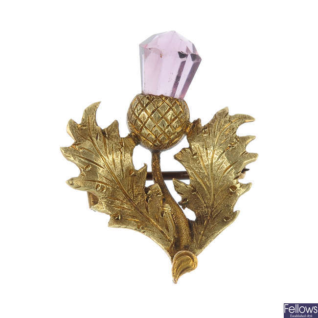 An early 20th century 18ct gold amethyst thistle brooch.