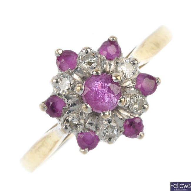 An 18ct gold ruby and diamond floral cluster ring.