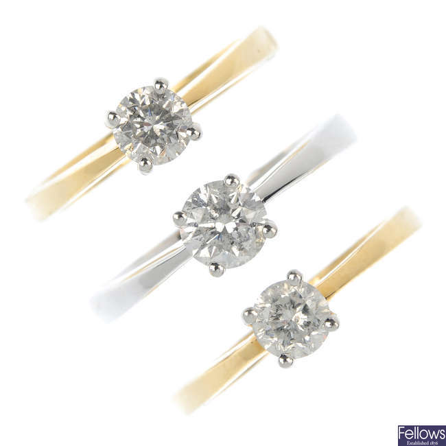 A selection of three 18ct gold diamond single-stone rings. 