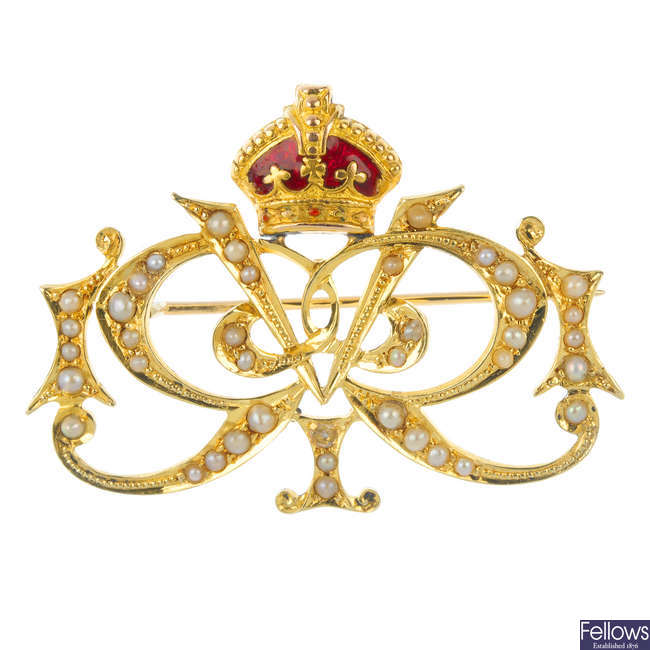 A 15ct gold red enamel and split pearl royal cypher brooch.