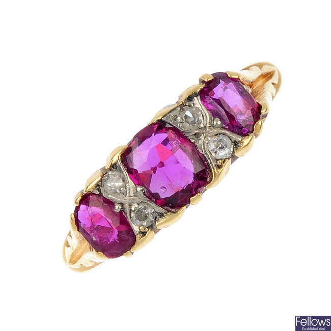 An early 20th century 18ct gold ruby three-stone ring.