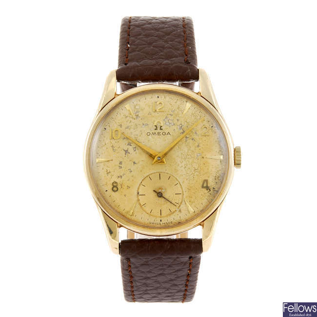 OMEGA - a gentleman's wrist watch.