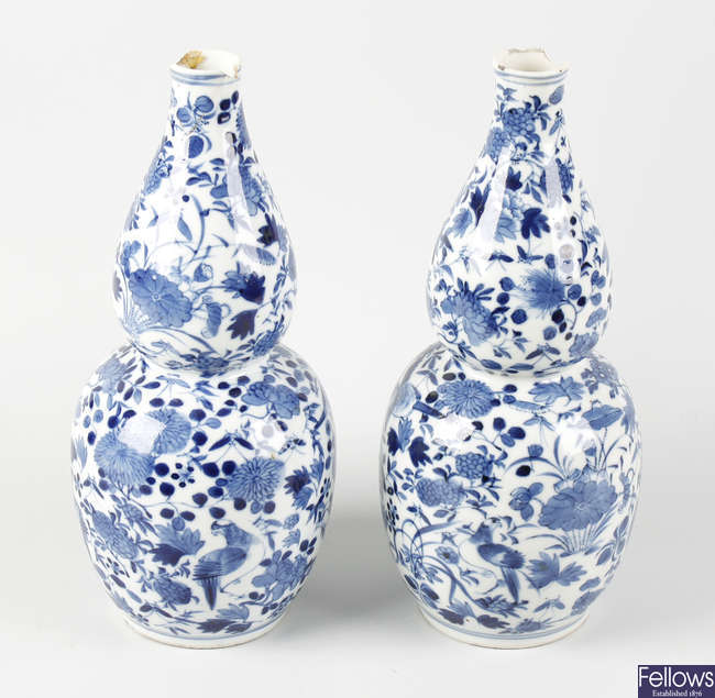 A pair of Chinese blue and white porcelain double gourd vases
