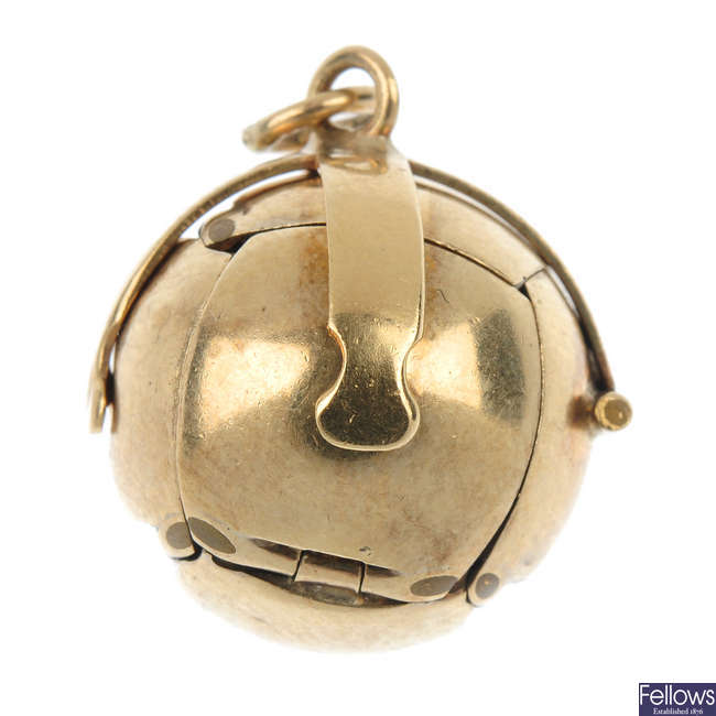 A silver gilt and gold mounted Masonic ball pendant.