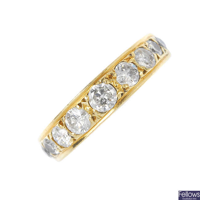 An 18ct gold diamond nine-stone ring.