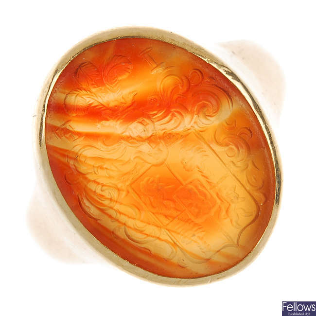 A 1930s 9ct gold hardstone intaglio seal ring.