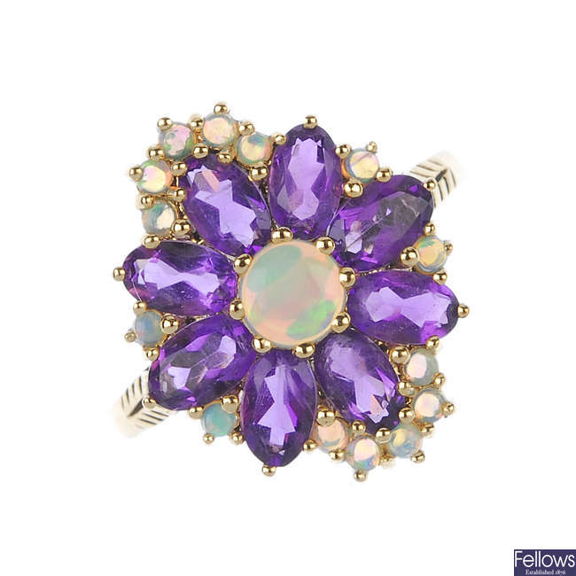 A 9ct gold opal and amethyst cluster ring.