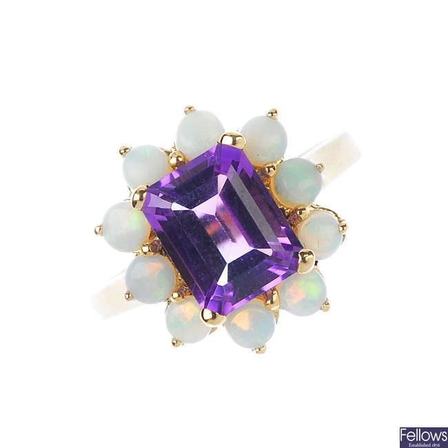 A 9ct gold amethyst and opal cluster ring.