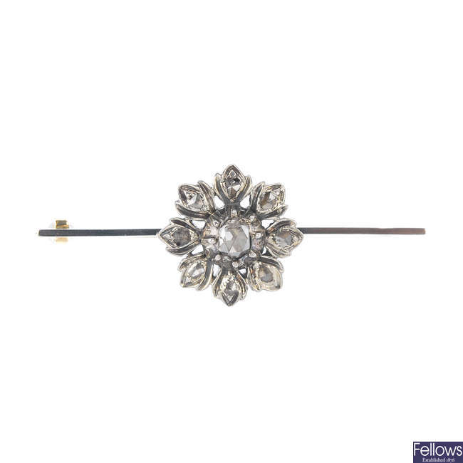An early 20th century silver and gold diamond floral bar brooch.