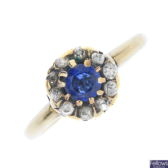 A mid 20th century 18ct gold synthetic sapphire and diamond cluster ring.