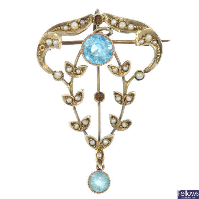 An early 20th century 9ct gold paste and seed pearl pendant. 