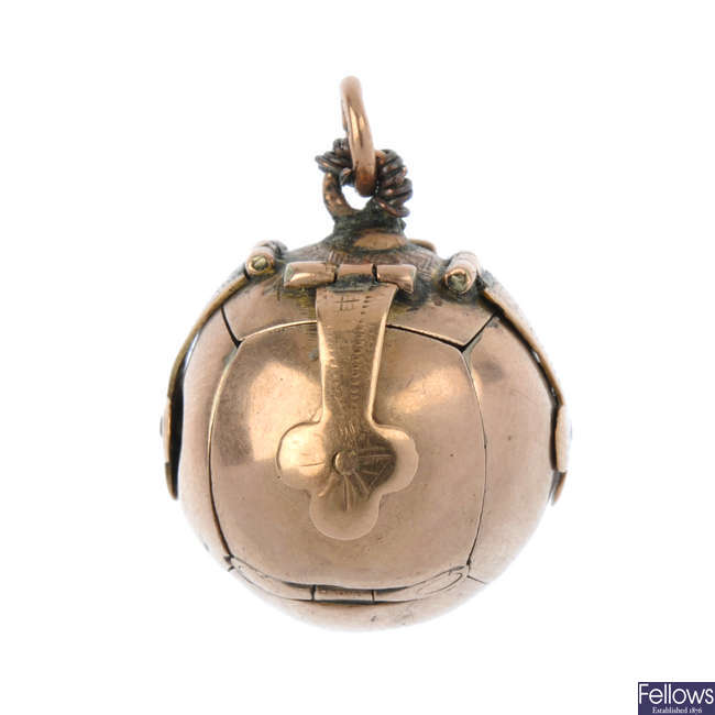 A mid 20th century silver gilt and 9ct gold mounted Masonic ball pendant. 
