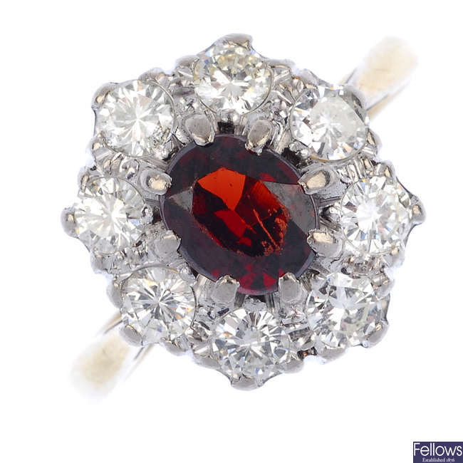 A garnet and diamond cluster ring. 