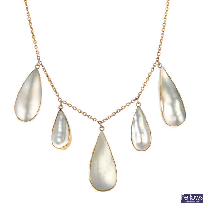 A mother-of-pearl fringe necklace.