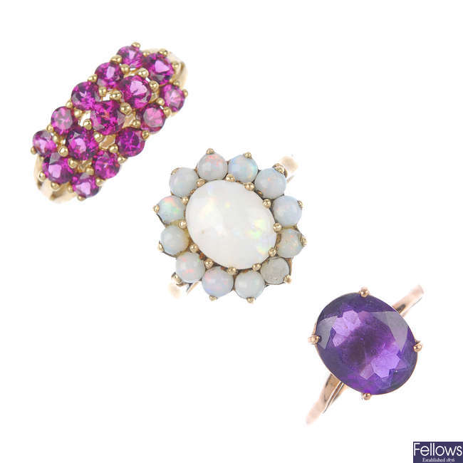 A selection of three 9ct gold gem-set dress rings.