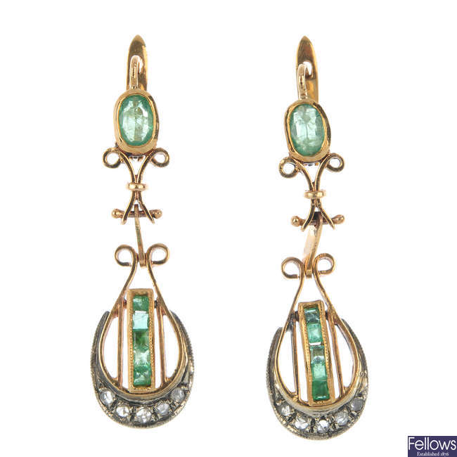 A pair of emerald and diamond ear pendants. 
