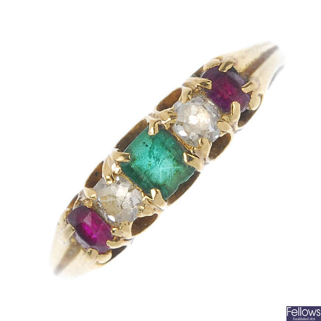 An early 20th century emerald, diamond and ruby five-stone ring. 