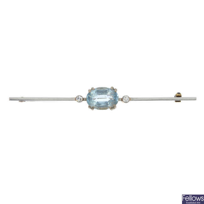 An early 20th century 15ct gold and platinum aquamarine and diamond bar brooch.