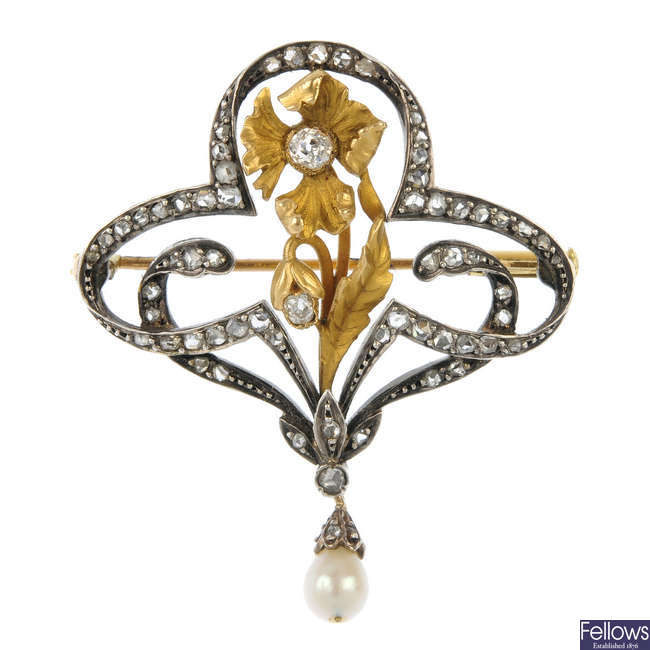 An Art Nouveau 18ct gold and silver diamond and cultured pearl brooch.