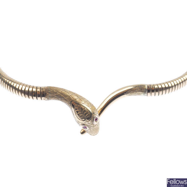 A mid 20th century 9ct gold snake necklace. 