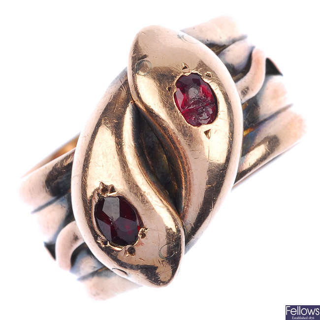 An early 20th century 9ct gold garnet snake ring.